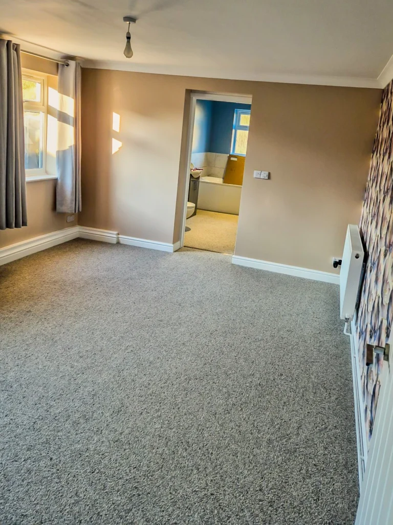 Carpeted Bedroom And En Suite